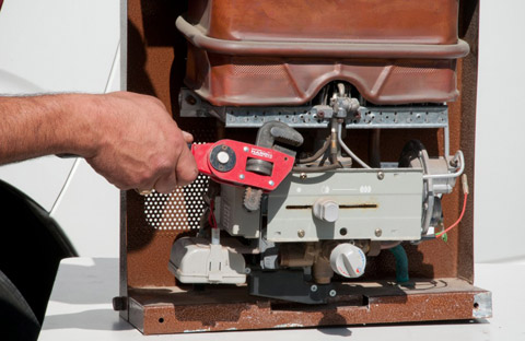 one of our Montebello water heater repair pros is installing a new tankless unit